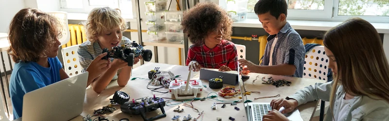 Group of kids playing with new educational toys